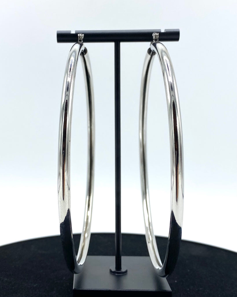 Oversized hoop earrings made in stainless steel and sterling silver dipped.