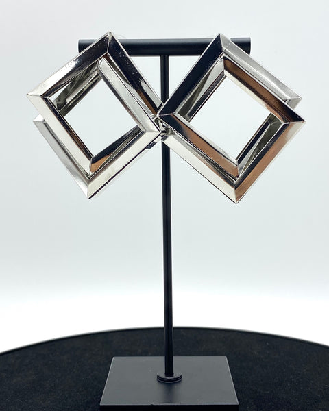 knotted metal squares design. Molded-in high-quality stainless steel and sterling silver-dipped.