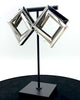 knotted metal squares design.  Molded-in high-quality stainless steel and sterling silver-dipped.
