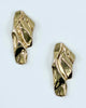 Abstract gold warped earrings made in stainless steel and karat gold dipped