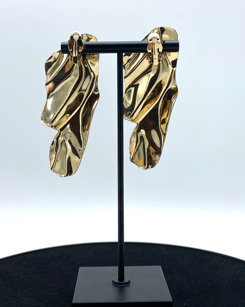 Abstract gold warped earrings made in stainless steel and karat gold dipped