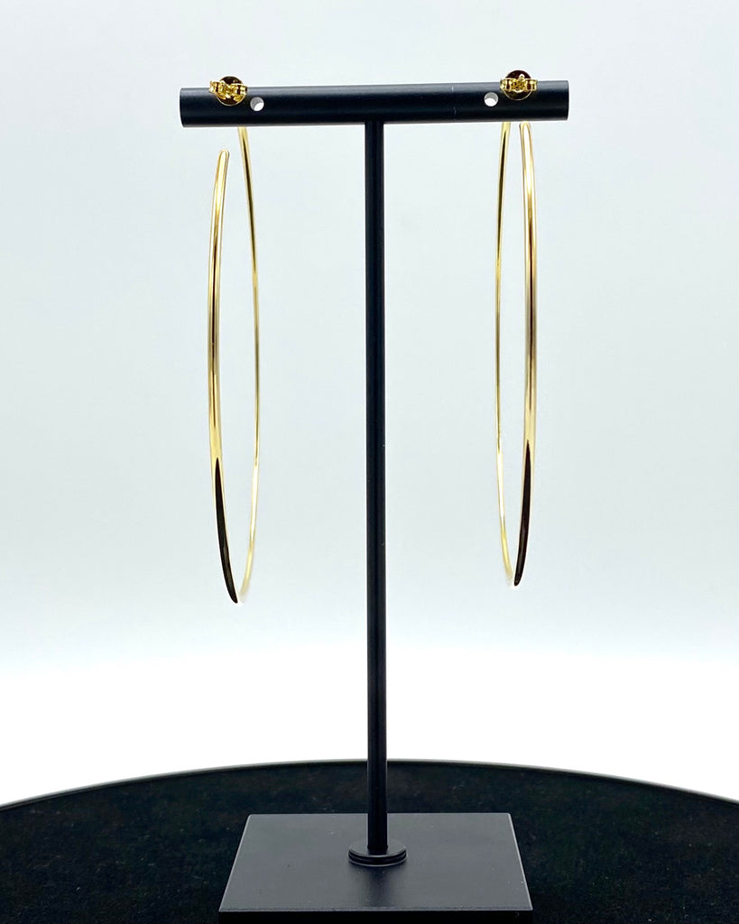 Asymmetrical Maxi hoop earrings Made in high-quality stainless steel and 14K karat gold-dipped..jpeg