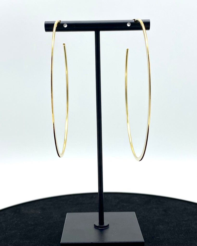 Asymmetrical Maxi hoop earrings Made in high-quality stainless steel and 14K karat gold-dipped..jpeg