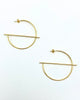 Geometric hoop design earrins made in 14k karat gold.