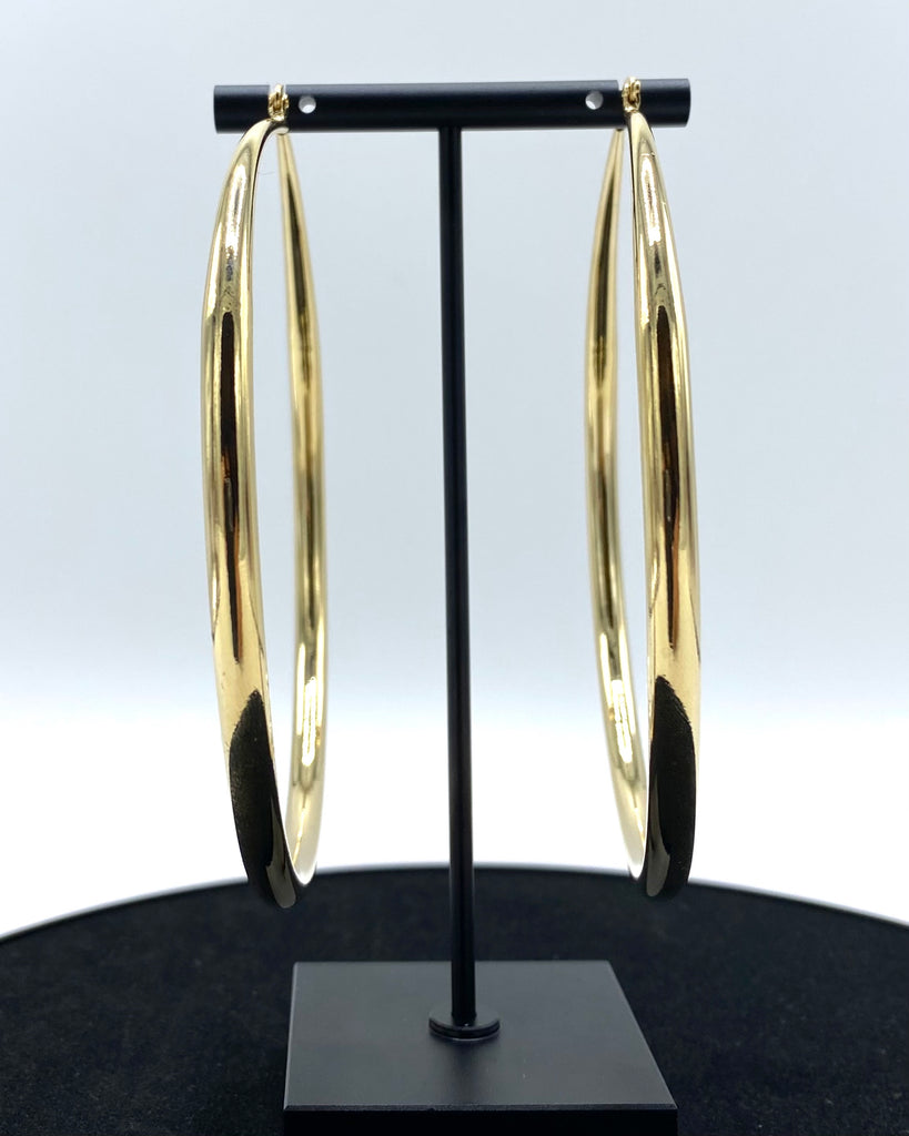Maxi hoop earrings Made in high-quality stainless steel and 14K karat gold-dipped.