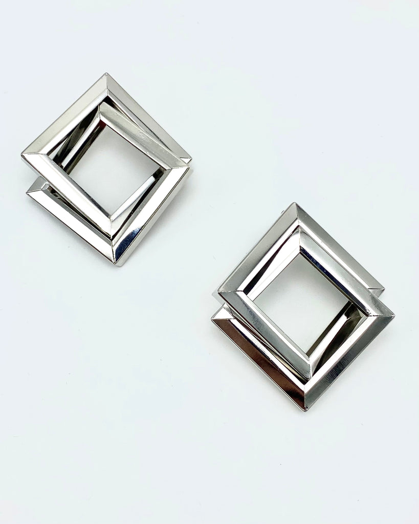 knotted metal squares design.  Molded-in high-quality stainless steel and sterling silver-dipped.